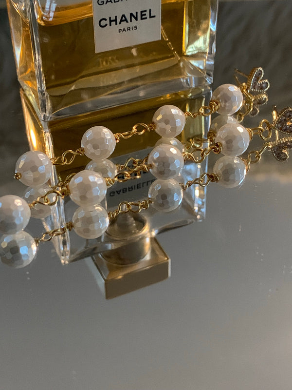 Øreringe med Shell perler & 18 karat guld